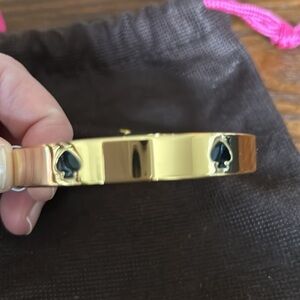 NWT Kate Spade gold bangle with black spades